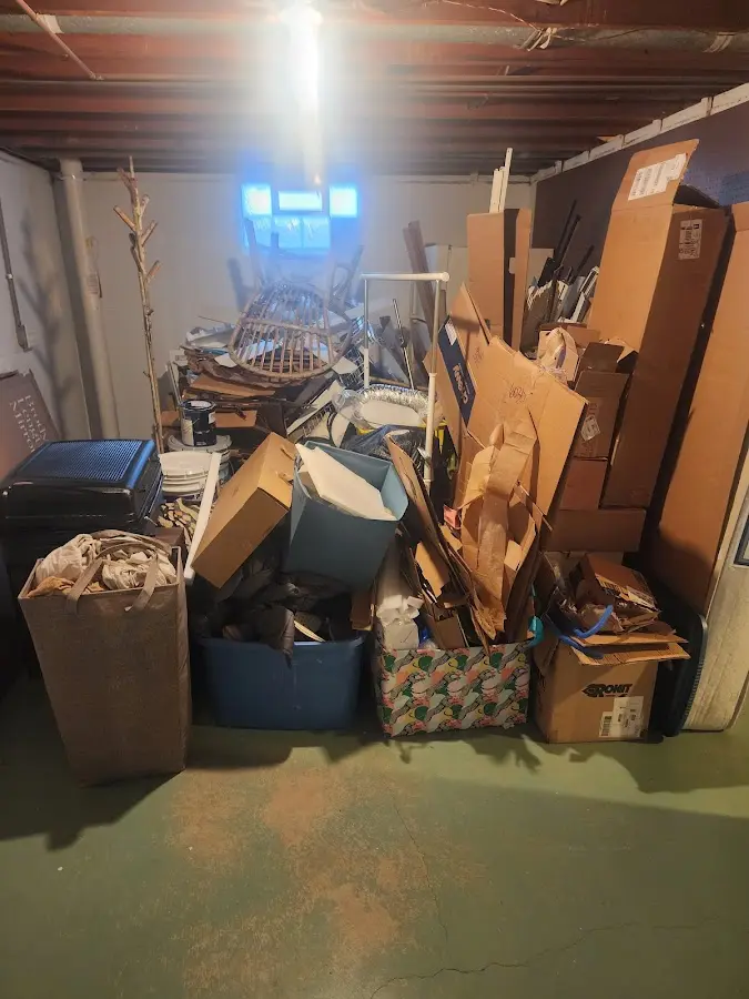 Roll-off dumpster container at job site for 4 Yard Dumpster Rental in Lawrenceburg